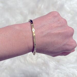 Coach bangle with small clear stone